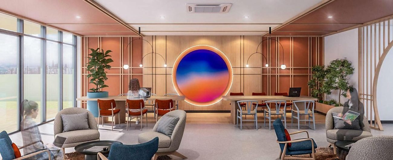 Artist's impression of the co-working space at Lunar Seputeh with a circular moon feature wall